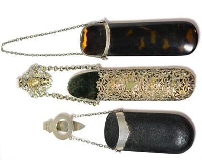 Lot 18 - Three spectacle cases with chatelaine clips in silver and tortoiseshell