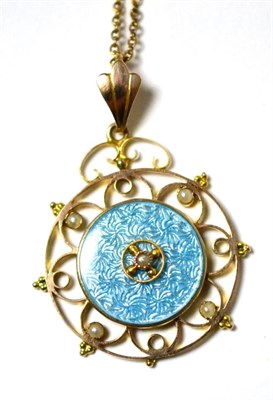 Lot 21 - A blue enamelled and split pearl pendant on chain, a blue guilloche enamel disc set centrally...