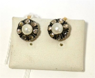 Lot 52 - A pair of pearl and rose cut diamond cluster earrings, a pearl within a border of seven rose...
