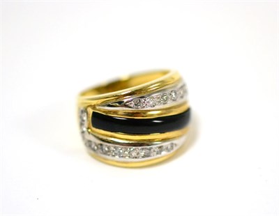 Lot 55 - A diamond and black enamel ring, with a black enamelled panel diagonally, and round brilliant...