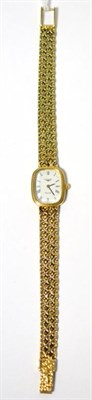 Lot 61 - A lady's 9ct gold wristwatch, signed Longines, circa 1990, quartz movement, white dial with...