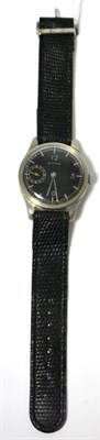 Lot 68 - A chrome wristwatch, signed Cyma, circa 1945, lever movement signed, black dial with Arabic and...