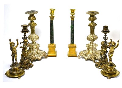 Lot 104 - Four pairs of 19th century brass, silver plate and bronze candlesticks including figural and...