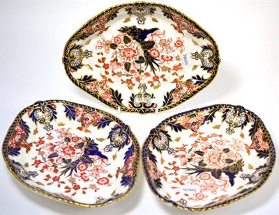 Lot 105 - A set of three Royal Crown Derby Imari pattern oval dessert dishes, 29cm long, painted marks