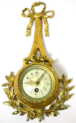 Lot 106 - A small gilt metal cartel timepiece, circa 1920, case with a bow and floral mounts, Arabic...