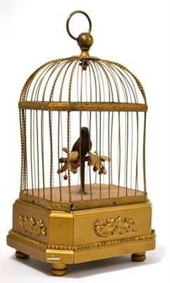 Lot 107 - A gilt metal singing musical bird cage