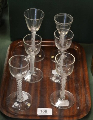 Lot 109 - A group of six 18th century wine glasses on opaque twist stems