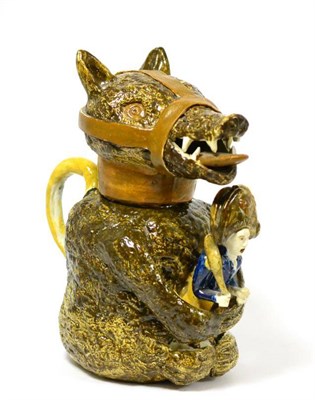 Lot 111 - A Staffordshire pearlware bear jug and cover, the seated animal with brown markings and ochre...