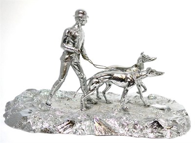 Lot 115 - Silver plated hare coursing figure group, signed Benton, 36cm diameter