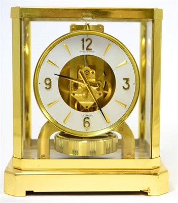 Lot 131 - A brass atmos clock, signed Jaeger LeCoultre, 20th century, glazed panels, 5-inch dial, large...