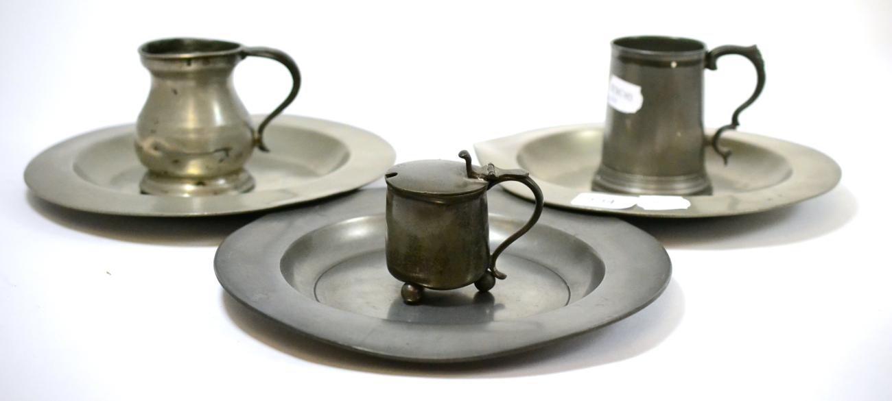 Lot 134 - Quantity of pewter comprising three 18th century plates, two tankards and a salt (6)