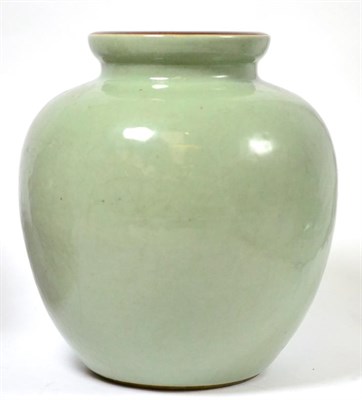Lot 145 - A Chinese crackle glaze pale green vase, 23cm high