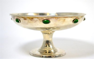 Lot 150 - An Arts & Crafts silver plated footed bowl decorated with green cabochons, by J B Glasgow