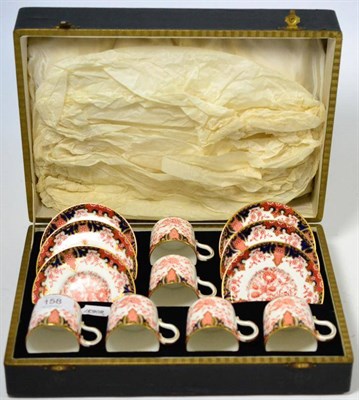 Lot 158 - A cased set of six Royal Crown Derby Imari pattern coffee cans and saucers