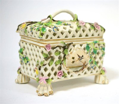 Lot 160 - A 19th century Meissen style flower encrusted pierced casket and cover, of rectangular form painted