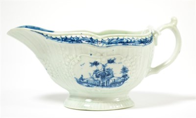 Lot 173 - A First Period Worcester strap flute sauce boat, painted underglaze blue with the Little...