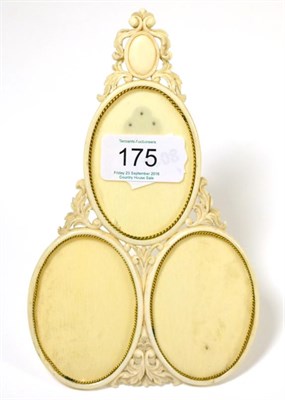 Lot 175 - A 19th century ivory triple oval frame, 18cm high
