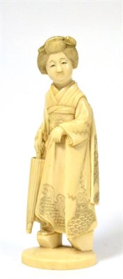 Lot 183 - A Japanese ivory okimono, Meiji period, as a lady with parasol, 16cm high