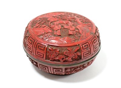 Lot 197 - A Chinese cinnabar lacquer circular box and cover, Tang Dynasty, carved with figures in...