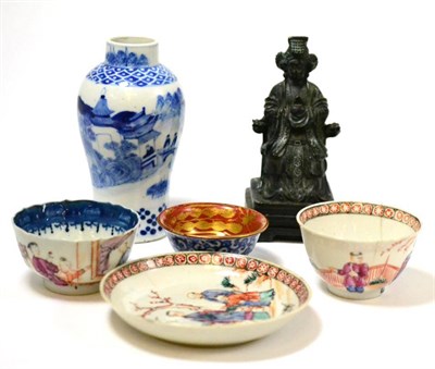 Lot 205 - A Chinese porcelain tea bowl and saucer, Qianlong; a similar tea bowl; a Kinrade type tea bowl;...