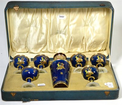Lot 219 - A cased Carlton ware cocktail set decorated with Chinese figures on a powder blue ground,...
