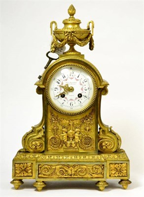 Lot 239 - A gilt metal striking mantel clock, retailed by Eug.Bagues, Paris, circa 1900, urn finial,...