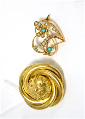 Lot 250 - A locket brooch (a.f.), the domed centre with beaded detail to the scroll frame, with glazed locket