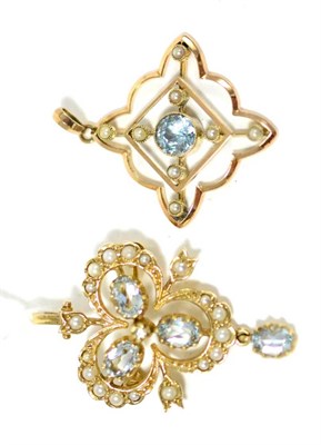 Lot 251 - A 9ct gold aquamarine and seed pearl brooch/pendant, three oval cut aquamarines within a...