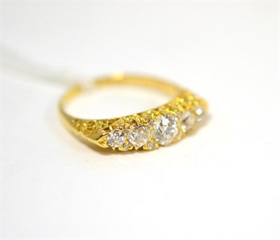 Lot 273 - An 18ct gold five stone diamond ring, graduated old cut diamonds, spaced by rose cut diamond...