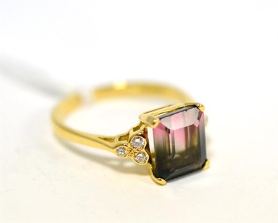 Lot 287 - An 18ct gold bi-coloured tourmaline and diamond ring, the emerald-cut tourmaline in yellow four...