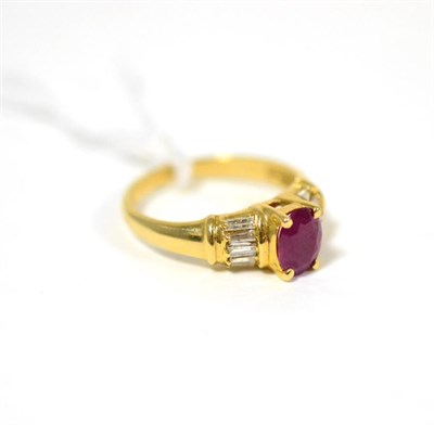 Lot 289 - A ruby and diamond ring, an oval cut ruby in yellow claw setting, to baguette cut diamond set...