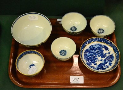 Lot 347 - ^A first period Worcester pagoda pattern tea bowl and saucer; a similar mother and child...