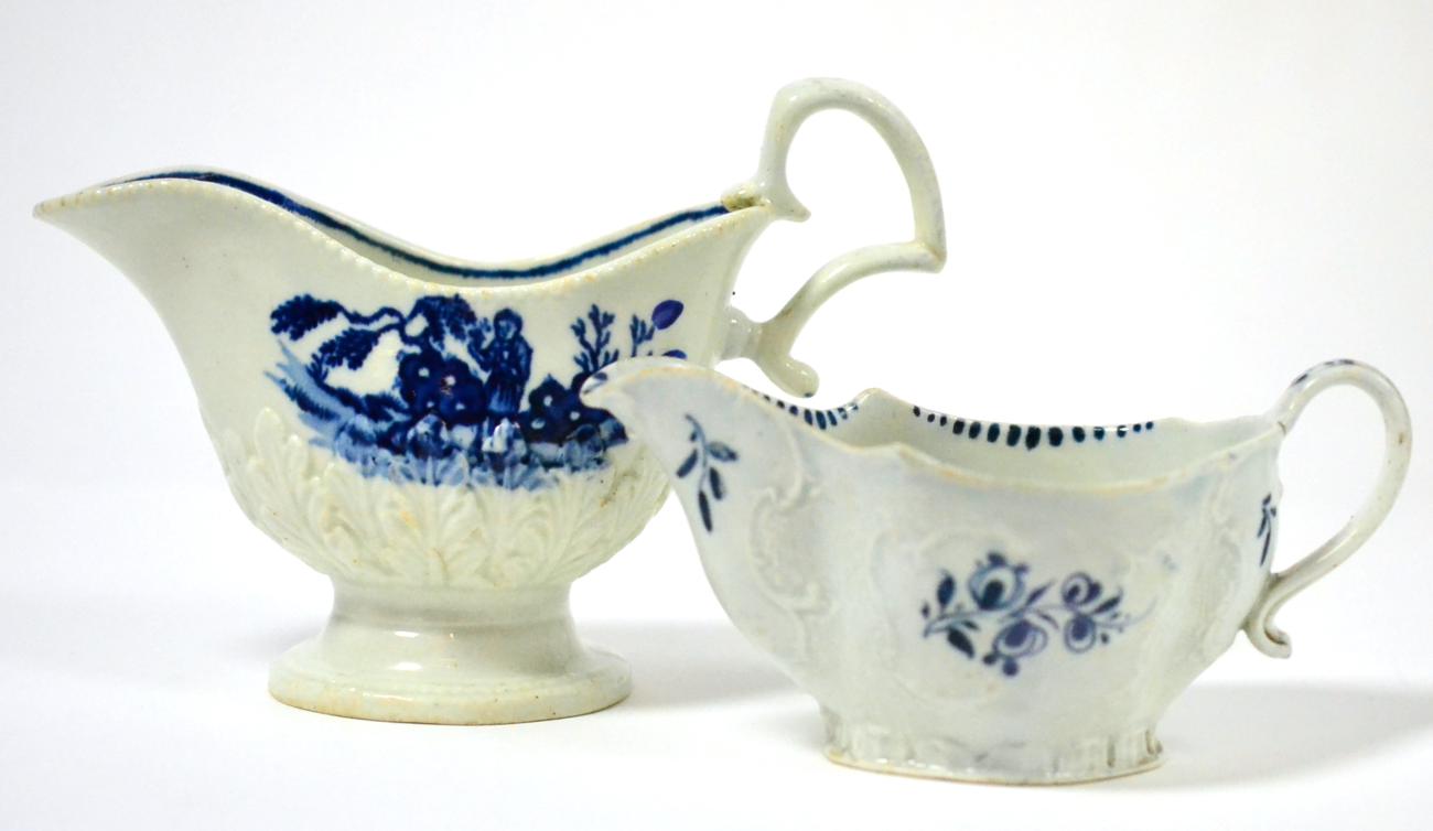 Lot 375 - A Seth Pennington helmet shaped sauce boat, circa 1780, printed in blue with Chinese figures,...