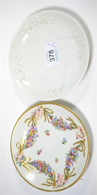 Lot 378 - A Doccia porcelain saucer, circa 1770, moulded with swags, 14cm diaemter, and a similar saucer with
