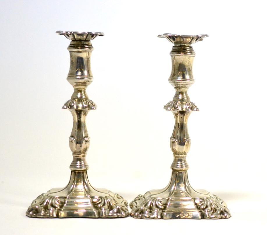 Lot 386 - A pair of Georgian style silver taper sticks, circa 1900, 12 cm high