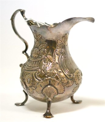 Lot 394 - A George III silver cream jug, London 1767