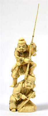 Lot 405 - A Japanese ivory okimono of fishermen, early 20th century, 17cm high