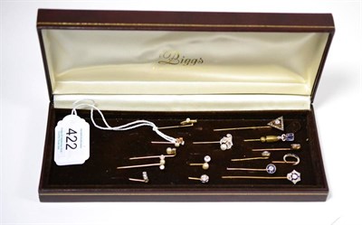 Lot 422 - Fifteen stick pins, including some Art Deco styles, and examples set with diamonds, pearls,...