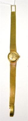 Lot 426 - A lady's 18ct gold automatic wristwatch, signed Omega, model: Ladymatic, circa 1970, lever...