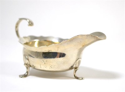 Lot 439 - A George II silver sauceboat by Isaac Cookson, Newcastle, 1751