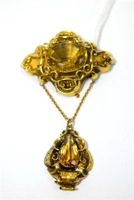 Lot 441 - A Victorian citrine set brooch, of quatrefoil form, an oval mixed cut citrine centrally, with...