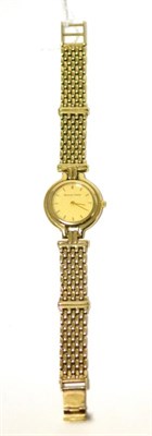 Lot 453 - A lady's 9ct gold wristwatch, signed Bueche Girod, circa 1990, quartz movement, textured dial...