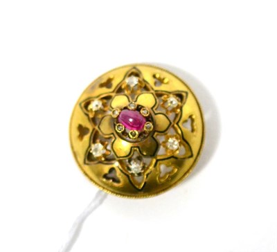 Lot 475 - A brooch, circa 1880, with a cabochon ruby centrally, six rose cut diamonds spaced around it,...