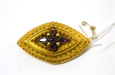 Lot 490 - A Victorian garnet brooch, the lozenge form of matt finish and decorated with rope twists and...