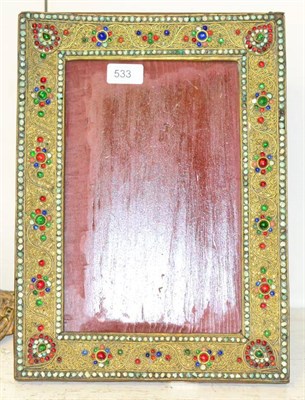 Lot 533 - A 19th century Indian easel backed mirror, the frame with gilt scroll and cabochon scrolling...