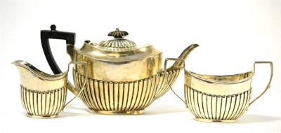 Lot 550 - A three piece silver morning tea service, London 1896