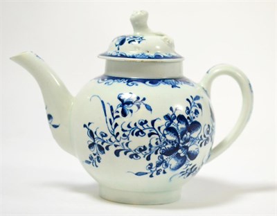 Lot 554 - A Lowestoft porcelain teapot and cover, circa 1780, painted with Mansfield pattern, 15cm high