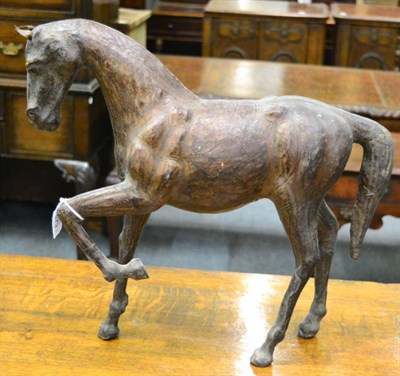 Lot 573 - A leather model of an Elephant, 60cm high, and Horse, 45cm high (2)