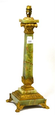 Lot 584 - A green alabaster and gilt metal mounted table lamp, 55cm high