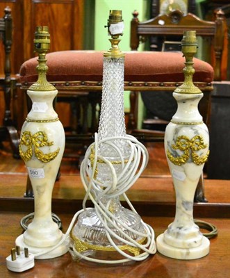 Lot 590 - A pair of white and grey marble table lamps with gilt metal ribbon swags, 46cm high and a cut glass